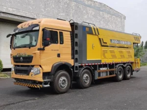 Fiber slurry seal vehicle