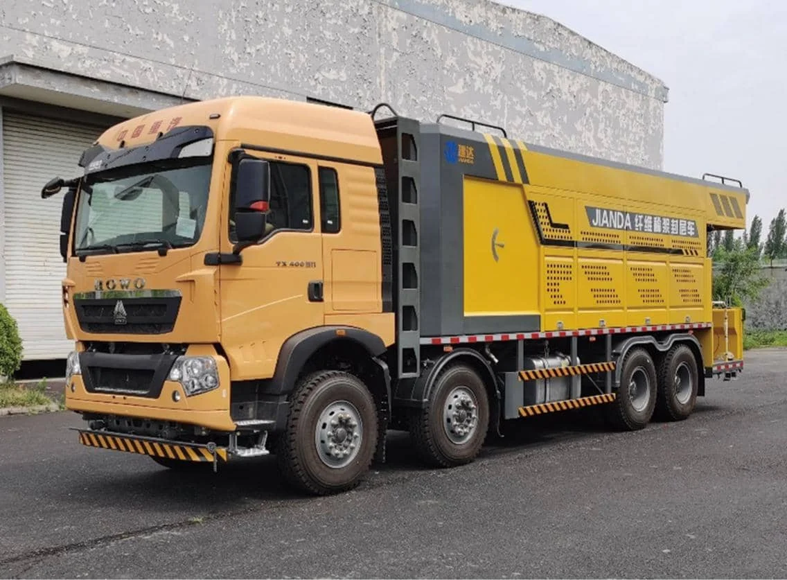 Fiber slurry seal vehicle